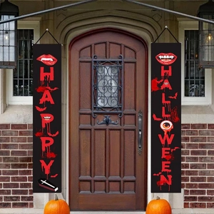 Close-up of Halloween door banners featuring red and black vampire and bat themed patterns