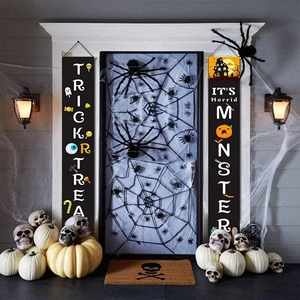 Close-up of Trick or Treat Halloween porch banners with spooky icons and festive graphics