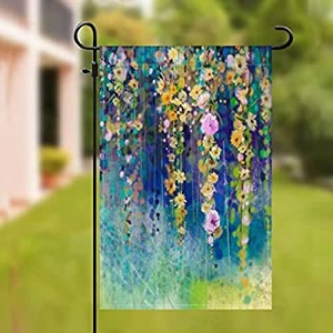 Detail of double-sided linen garden flag with watercolor flowers on black metal stand