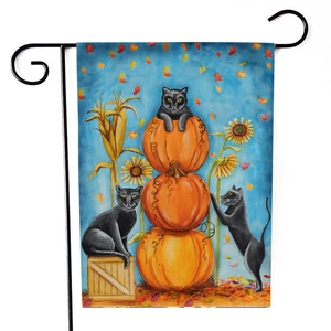 Double-sided Halloween garden flag featuring stacked pumpkins, black cats and autumn leaves