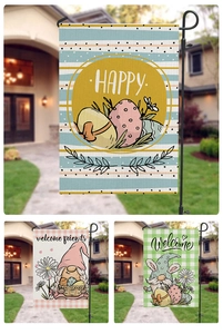 Close-up of Easter garden flags with gnome and floral prints on burlap texture