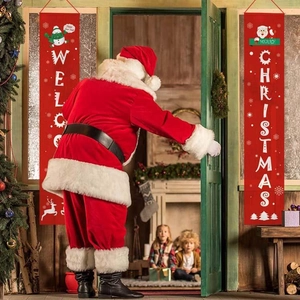 Close-up of red Christmas porch banners with Merry Christmas lettering and festive motifs