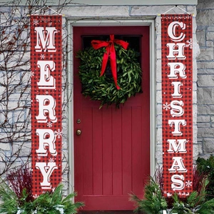 Close-up of red and black buffalo plaid Merry Christmas porch banners on a red door