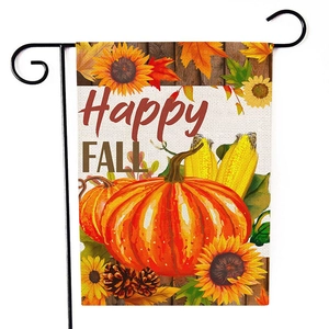 Detail of Happy Fall garden flag showing pumpkin and sunflower print on linen fabric