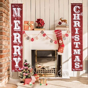 Vertical buffalo plaid Christmas banners featuring Merry Christmas text by fireplace