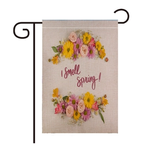 Detailed texture of polyester linen garden flag with I Smell Spring floral print
