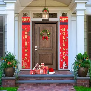 Close-up of vibrant red Merry Christmas door banners with Santa Claus and reindeer icons