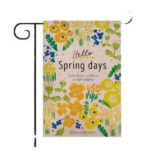 Outdoor spring garden flag with yellow flowers and Hello Spring text on metal stand