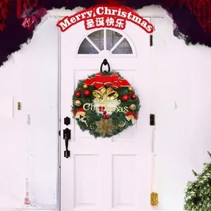 Detailansicht der roten Frohe Weihnachten Türbanner und des Feiertagskranz-Deko-Sets