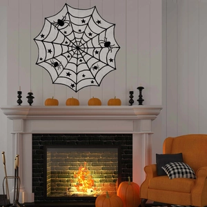 Detail of black lace spider web fireplace runner with spider and star accents