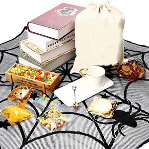 Detail of black spider web lace table runner with star patterns for Halloween decor