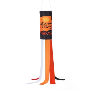 Halloween windsock featuring pumpkin silhouette and orange moon with long colorful ribbons