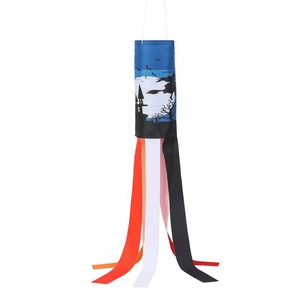 Detail of Halloween windsock showing witch silhouette and colorful hanging streamers