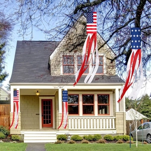 Set of four American flag windsocks with stars and stripes for outdoor patriotic decor