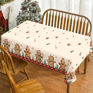 Gingerbread man Christmas tablecloth with festive prints for holiday dining room decor