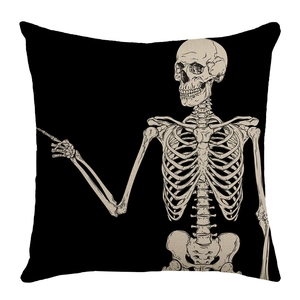 Macro detail of skeleton illustration on black linen Halloween decorative pillow cover