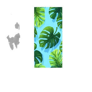 Absorbent microfiber beach towel with tropical green monstera leaves on sky blue background