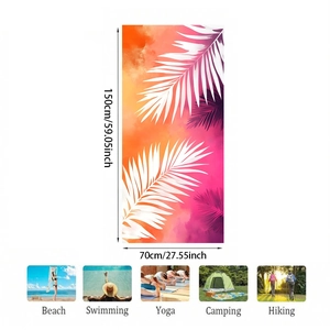 Microfiber beach towel 150x70cm featuring tropical white palm leaves on a vibrant gradient