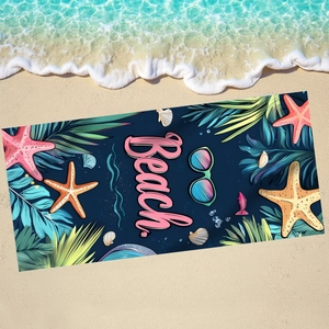 Microfiber beach towel with starfish print and Beach text on dark blue sand background