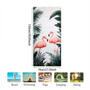 Microfiber beach towel with flamingo print and 150x70cm dimensions guide