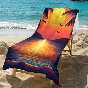 Microfiber beach towel with sunset palm tree print on a wooden chair by the sea