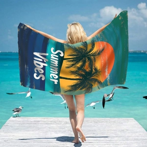 Microfiber beach towel with sunset palm tree print and Summer Vibes text for beach travel