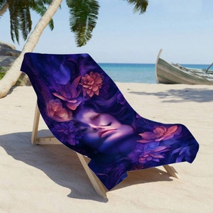 Dreamy purple microfiber beach towel with artistic girl print on an outdoor sand chair