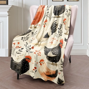 Artistic farmhouse rooster print flannel throw blanket on a pink chair in a cozy room