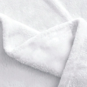Soft white flannel blanket with three Christmas gnome digital prints for cozy nap time use