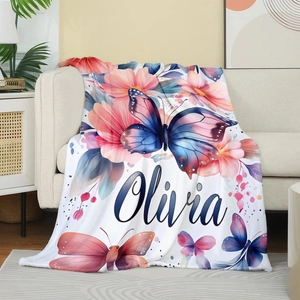 Detailed texture of flannel blanket with colorful watercolor butterfly and Olivia name custom
