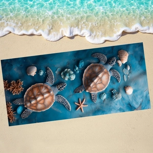 Microfiber beach towel with sea turtle print on sand beach with ocean waves backdrop