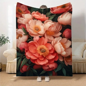 Detailed texture of flannel blanket featuring elegant large floral prints in home setting