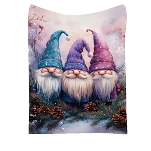 Winter flannel blanket featuring three Christmas gnomes with pine cones and snowflakes