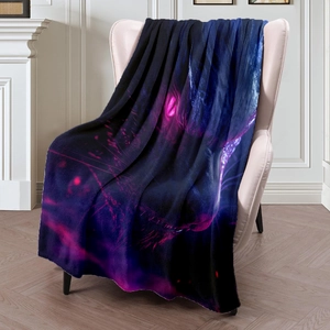 Cosmic neon panther flannel throw blanket draped over a beige armchair in a modern living room