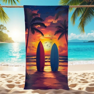 Microfiber beach towel featuring sunset palm trees and surfboards in vibrant tropical print
