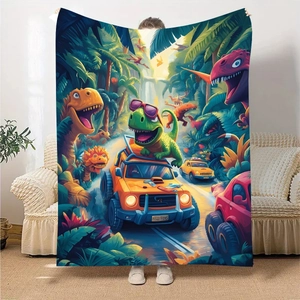 Detail showing soft flannel blanket with colorful dinosaur and racing car digital prints