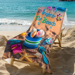 Microfiber beach towel with colorful sea shells and starfish design on sand background