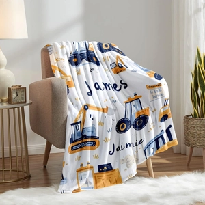 Customized flannel blanket with blue and yellow construction trucks and James name print