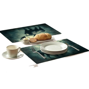 Set of two navy blue placemats with mystic fantasy forest motif and dining utensils