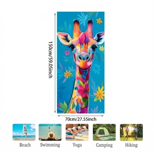 Detailed view of microfiber beach towel with colorful giraffe print and size dimensions