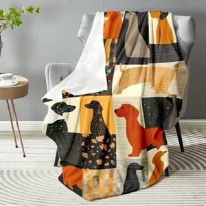 Cozy flannel blanket with colorful dachshund puzzle print and white sherpa lining