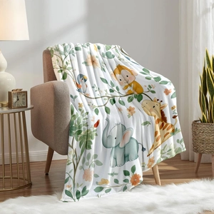 Detailed texture of jungle animal flannel blanket draped over a cozy brown fabric sofa
