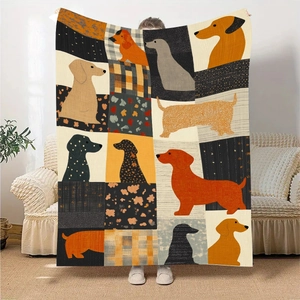 Detail showing colorful dachshund patchwork pattern on soft flannel throw blanket fabric