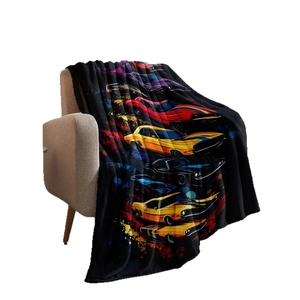 Soft flannel blanket with colorful vintage muscle car patterns on a black background