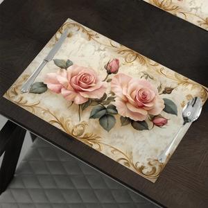 Vintage Victoria pink rose table mat with golden scroll border on dark wood surface