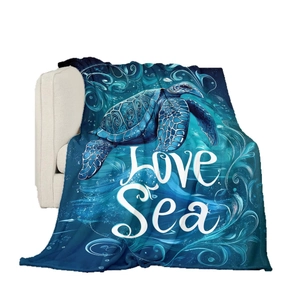 Deep blue flannel blanket featuring a decorative sea turtle print with Love Sea text design