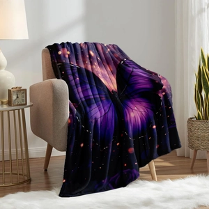 Plush purple butterfly flannel blanket with starry space pattern on a cozy beige sofa