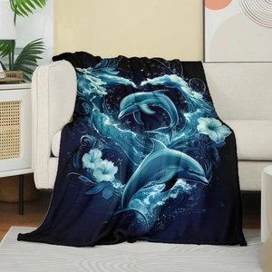 Detailed texture of flannel blanket featuring marine dolphin and ocean wave art prints