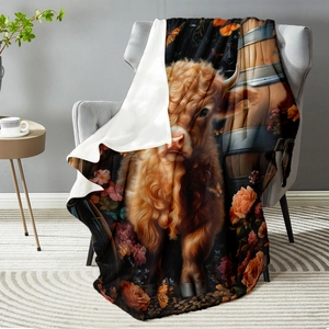 Cozy West Highland Cattle printed flannel blanket draped over a modern sofa