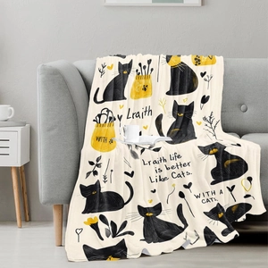 Cartoon cat flannel blanket featuring life is better with cats slogan on gray sofa